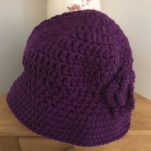 Plum colored hat, too cute for words.